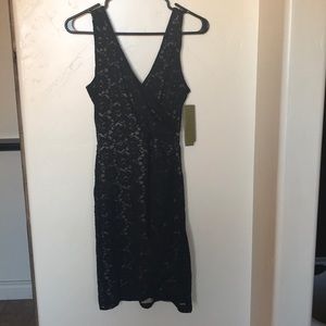 Nicole Miller Black and Tan lace bodycon dress.